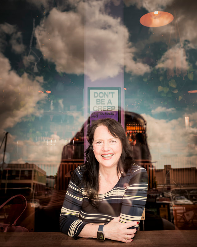 Fabrizia Costa, photographed through a café window